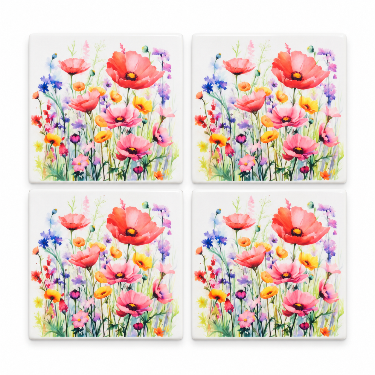 Four watercolor meadow ceramic coasters.png