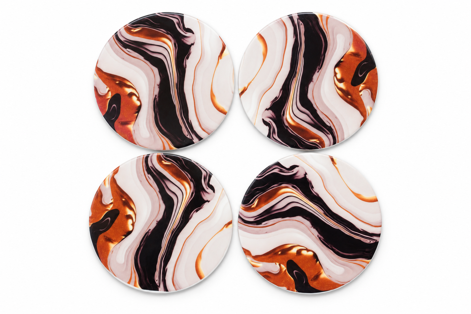 Four swirled ceramic coasters.png