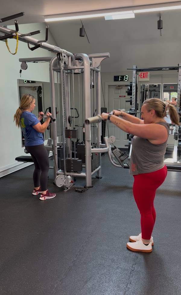 Clients working through a group circuit to build muscle and burn fat.