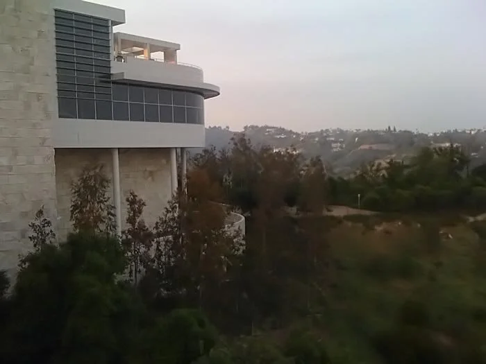 The sun setting behind the Getty