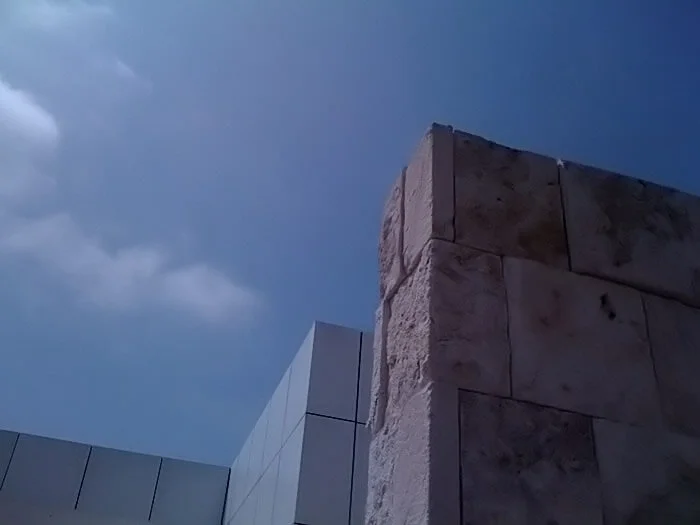 The Getty’s travertine and aluminium squares against a blue sky.