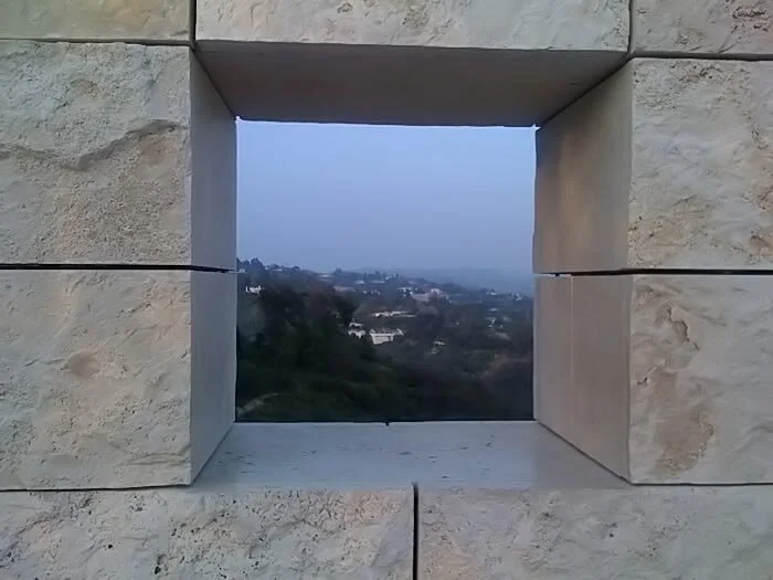 A framed landscape of Los Angeles from the Getty