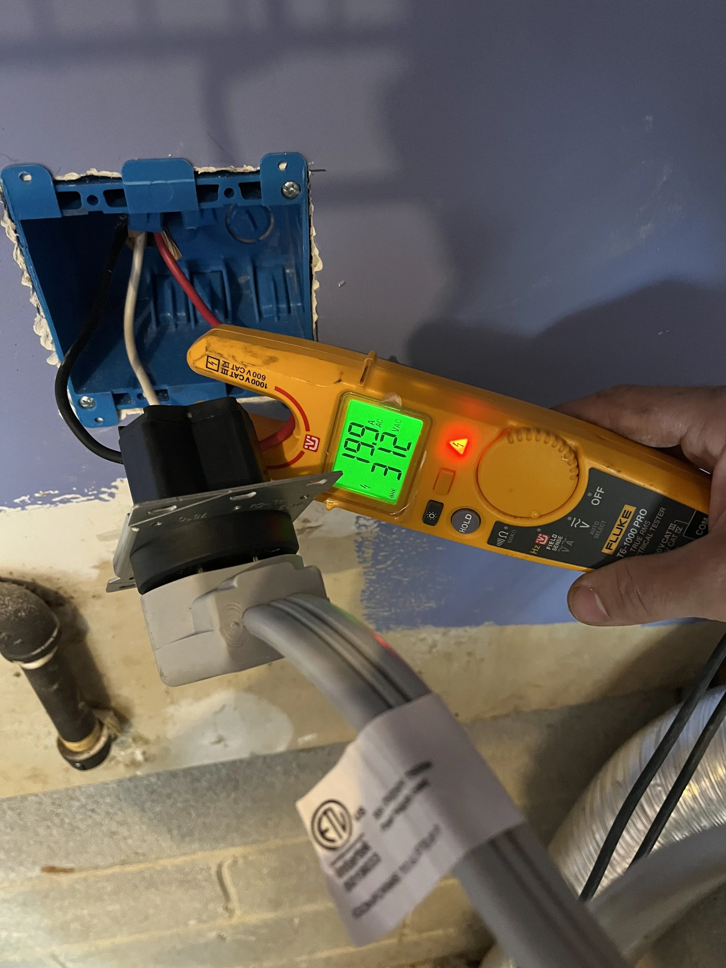 Electrician diagnosing an electrical panel in a Lebanon, TN home