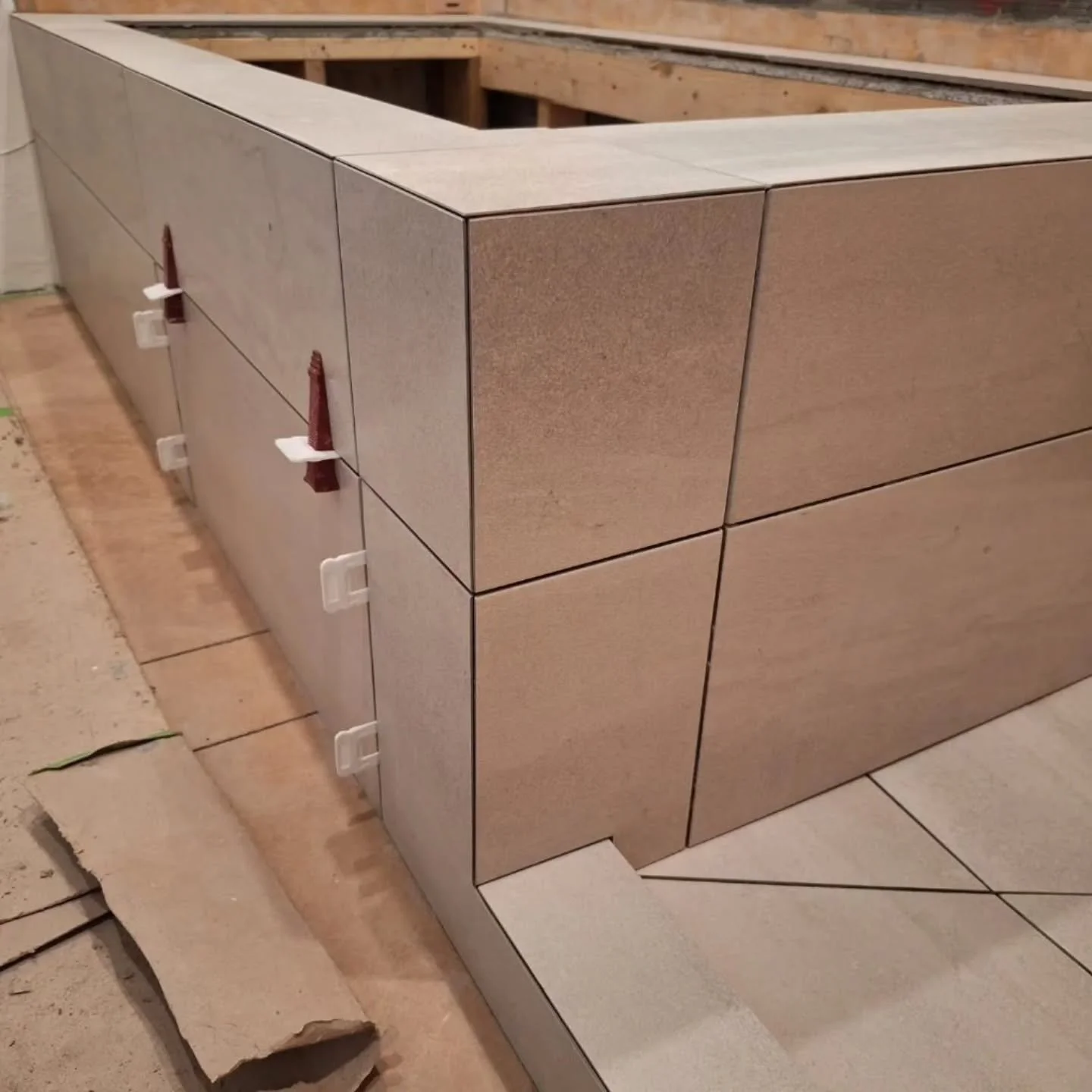 It&rsquo;s all in the details. 👌

Clean mitred corners and carefully planned envelope cuts, allowing large-format tile to follow the shower pan&rsquo;s slope to the drain. Every cut has a purpose.

Functional design. Crafted by Bare Hands.

#BareHan