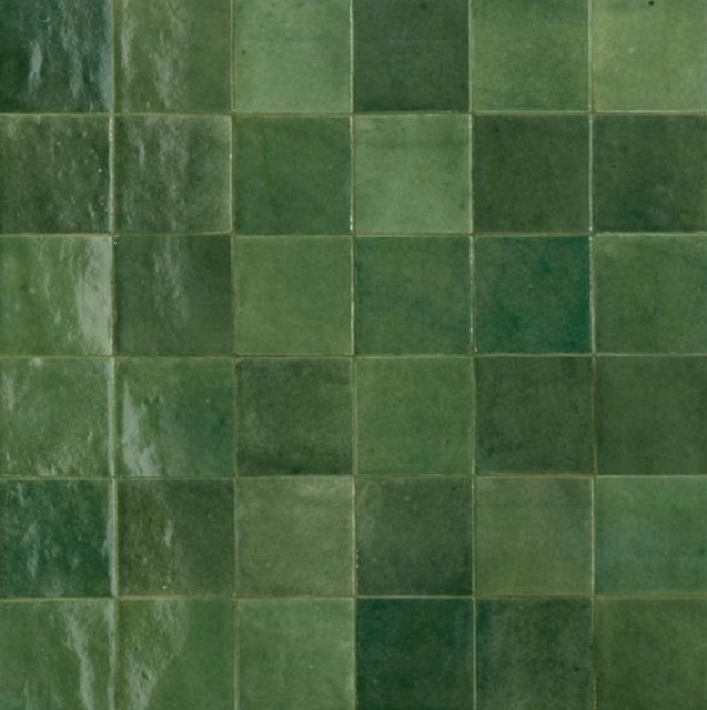 Close-up of green ceramic tiles arranged in a grid pattern.