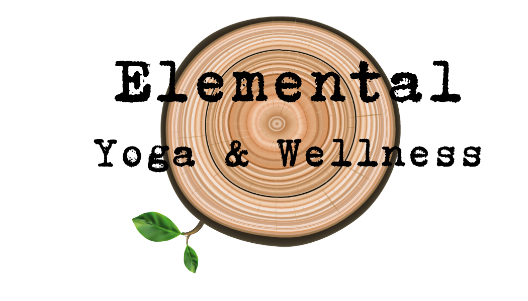 A wooden tree slice with the words 'Lemonent', 'a & Welln' inscribed on it, decorated with a small green leaf.