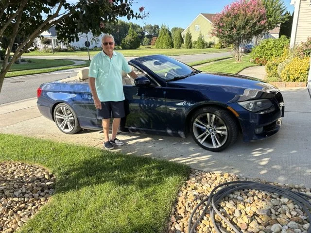 ray with car.jpeg