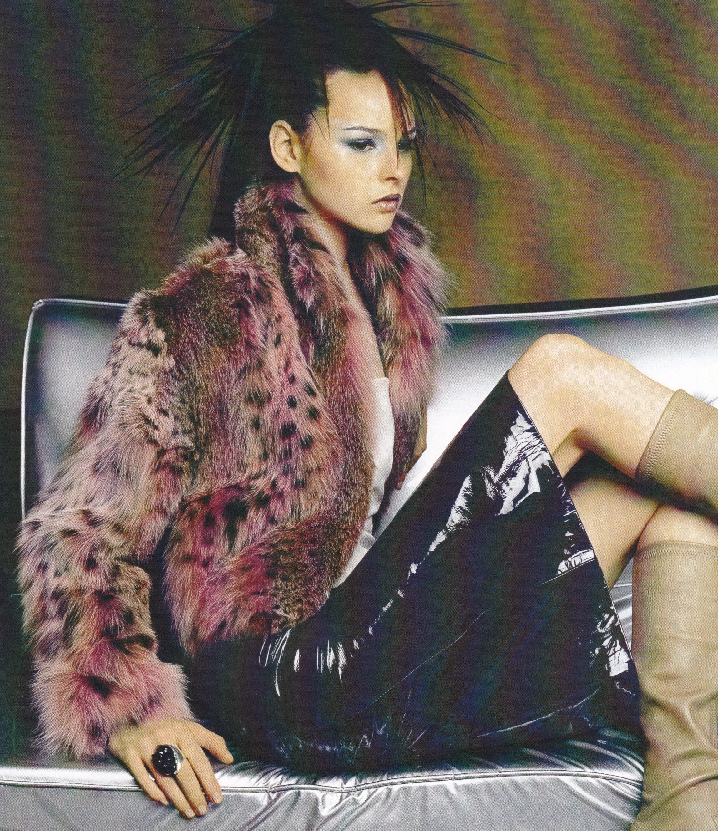 woman wearing fur coat and leather skirt