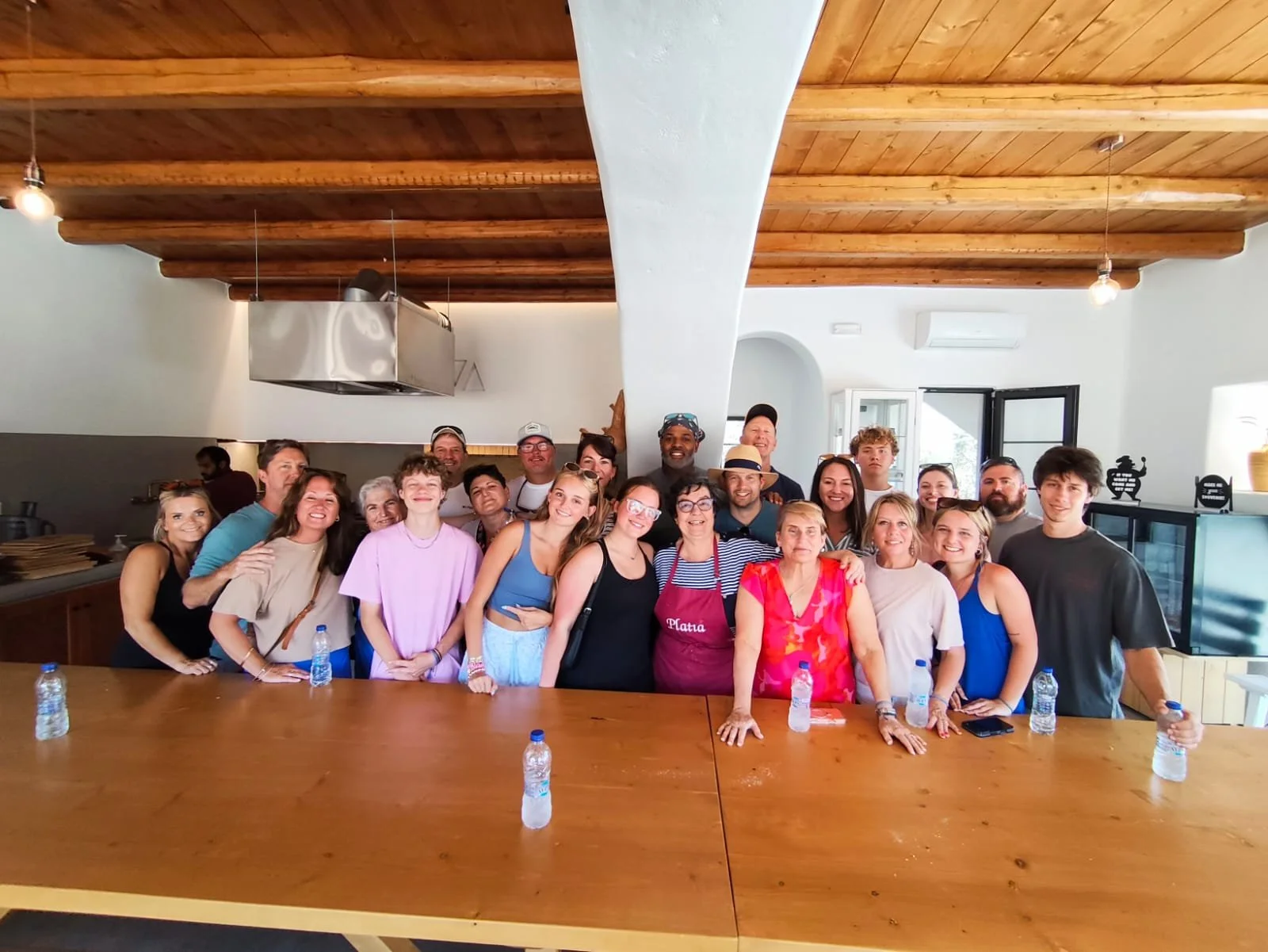 Our Greece group gathered around the kitchen table for Cooking with Yaya.