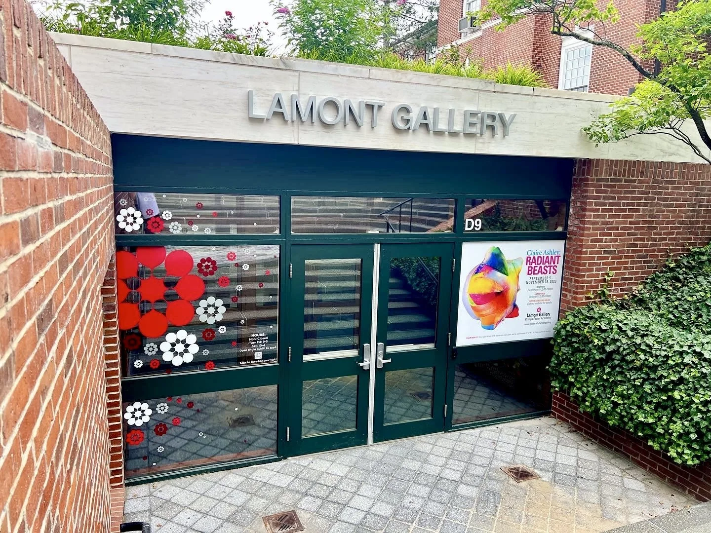 Entrance to Lamont Gallery displaying a Claire Ashley “Radiant Beasts” exhibition poster