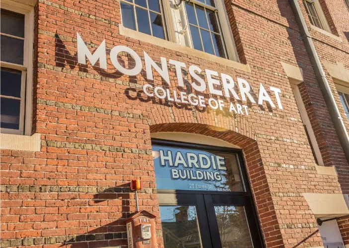 Montserrart College of Art sign on the brick Hardie Building entrance