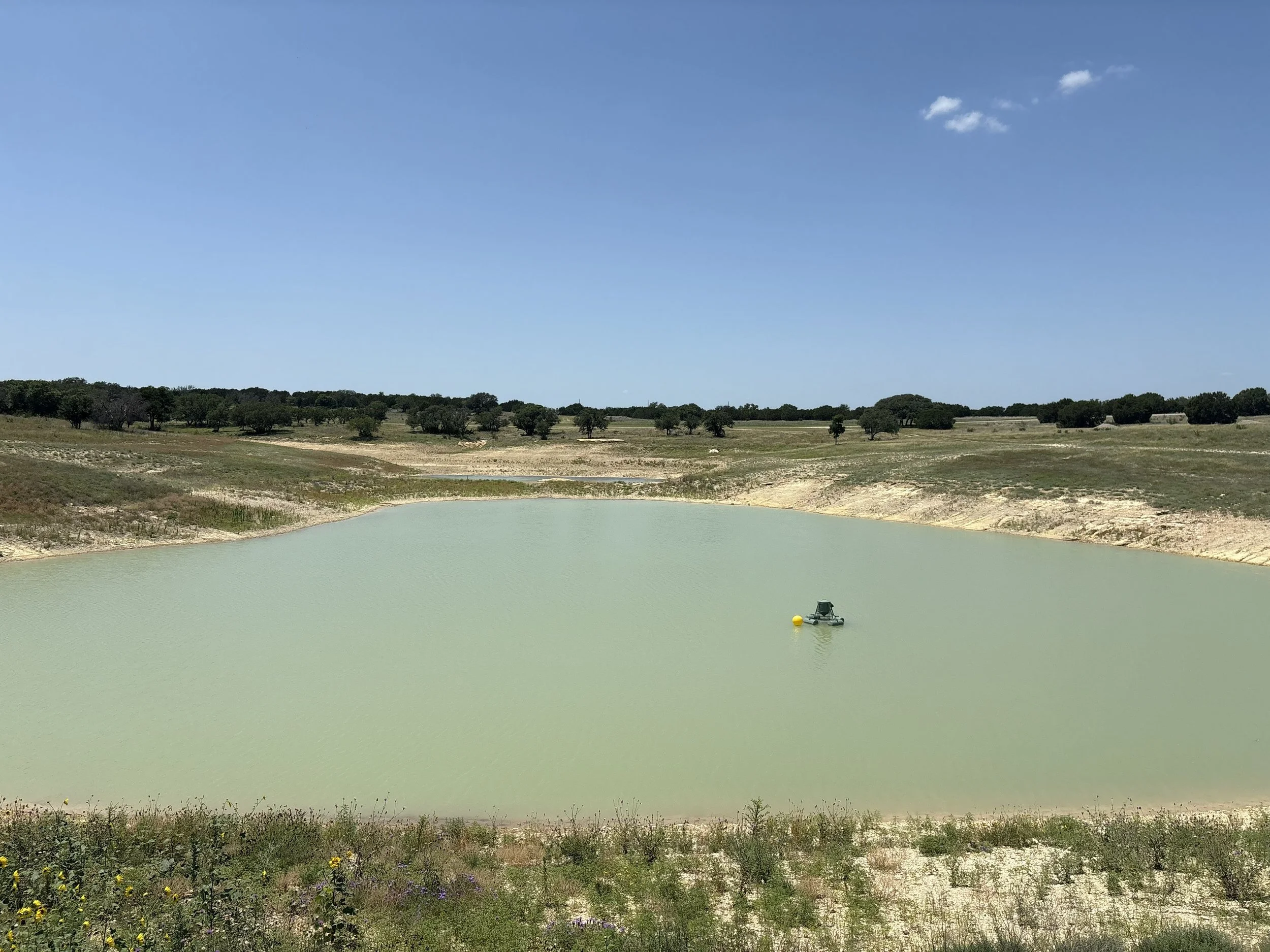 Koether Dozing building a stock tank dam in Central Texas