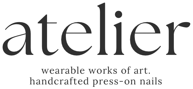 Logo with the word 'atelier' and the description 'We craft the work of art, handcrafted press-on nails'.