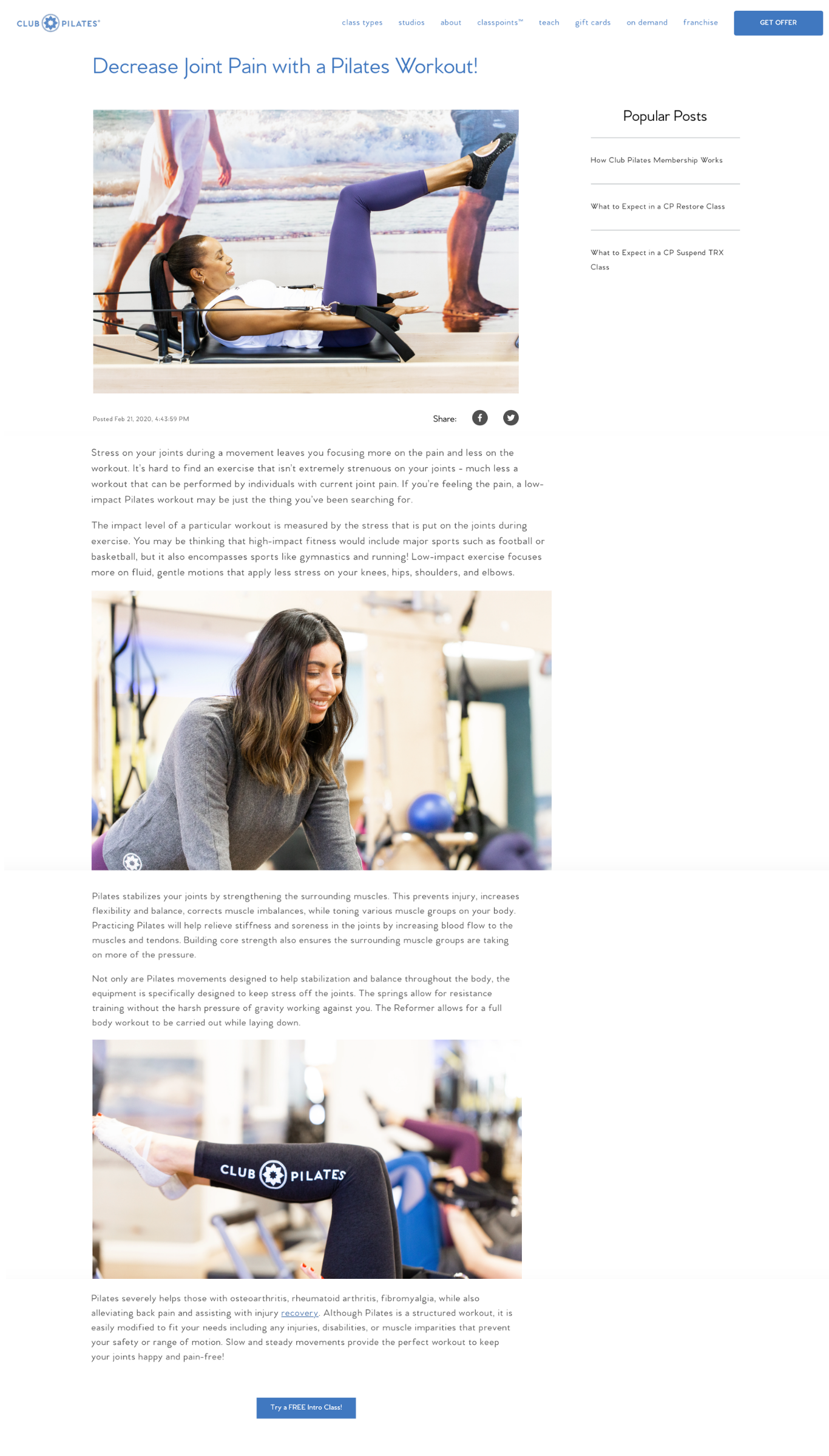 Woman lying on a Pilates reformer machine performing a leg lift exercise at a fitness studio.