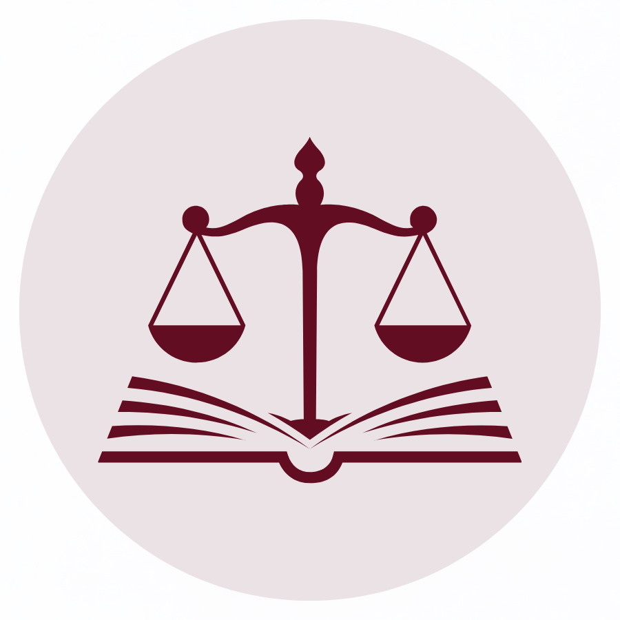 Scales of justice above an open book, representing law and legal principles.