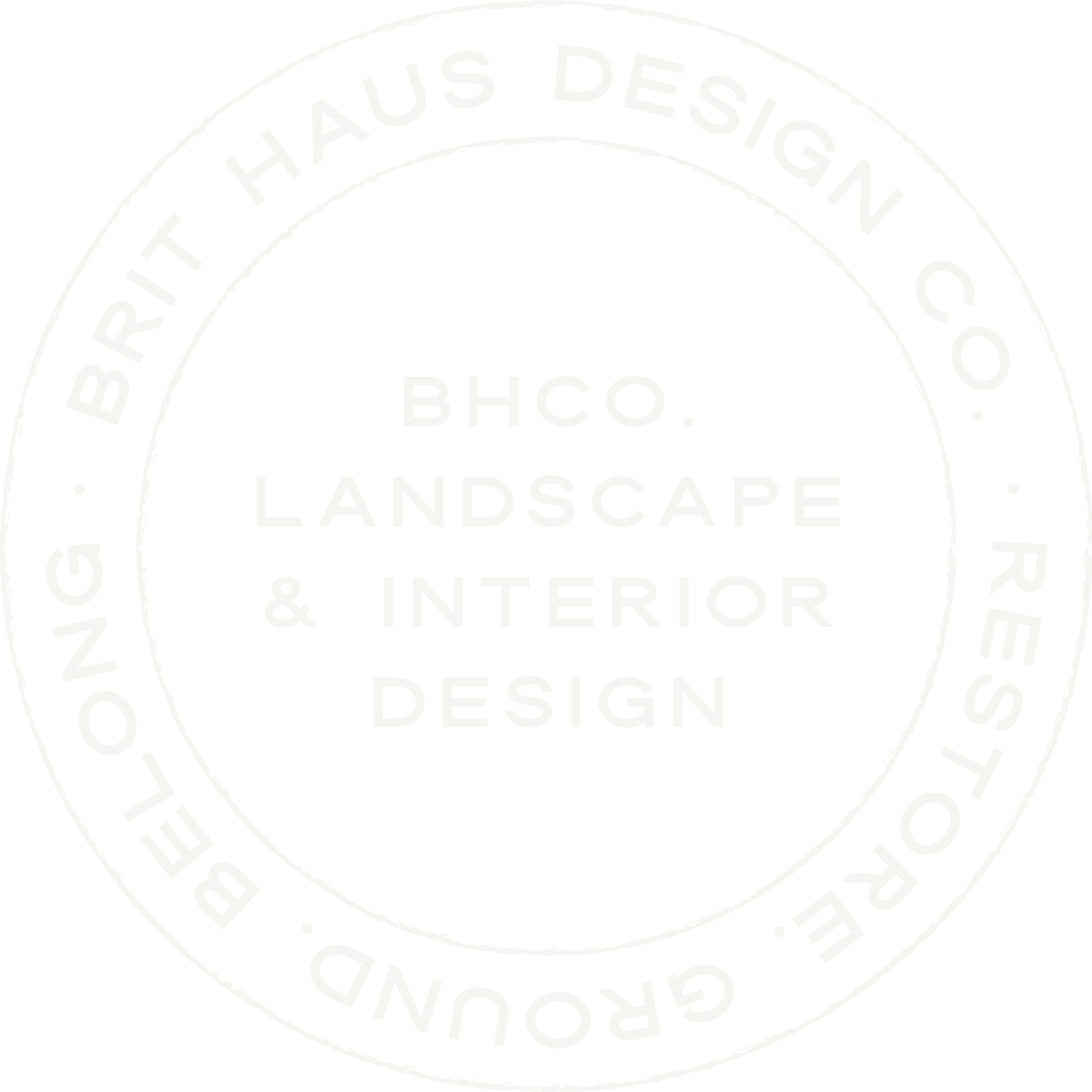 Circular logo with white text on a black background reading 'Britt Haus Design Co. Landscape & Interior Design'.