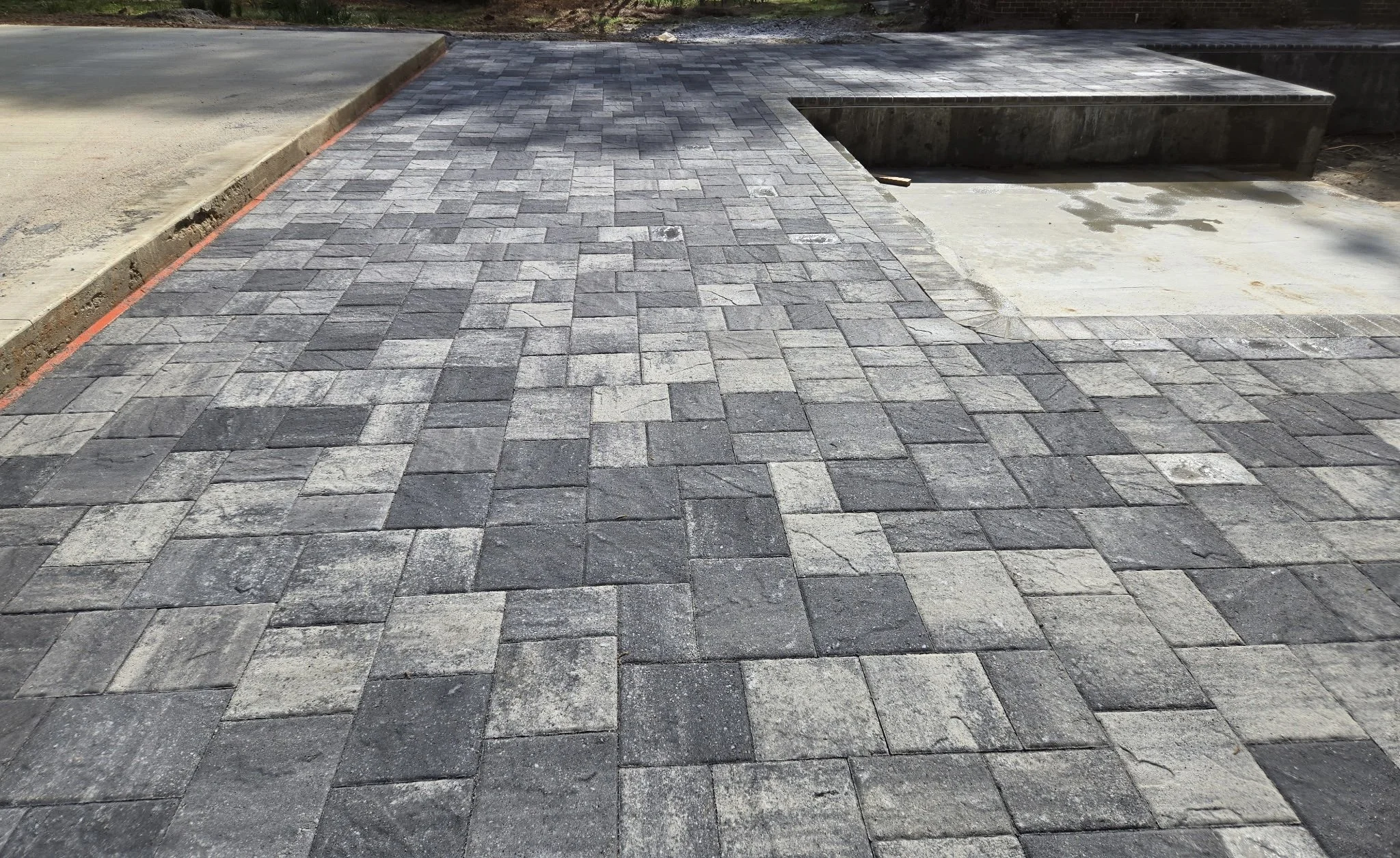 A paved pool deck