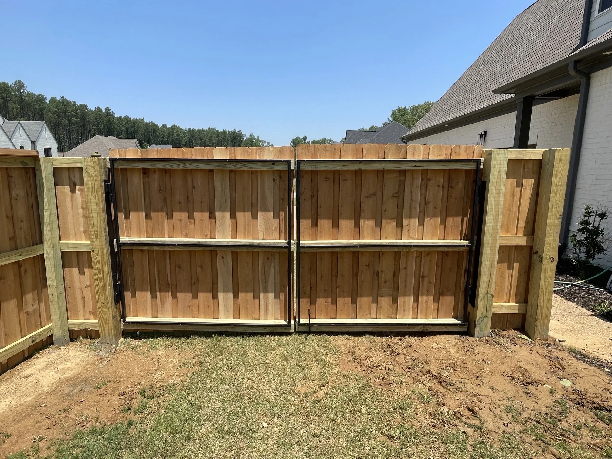 Custom metal gate with cedar board on board fencing, Memphis, TN