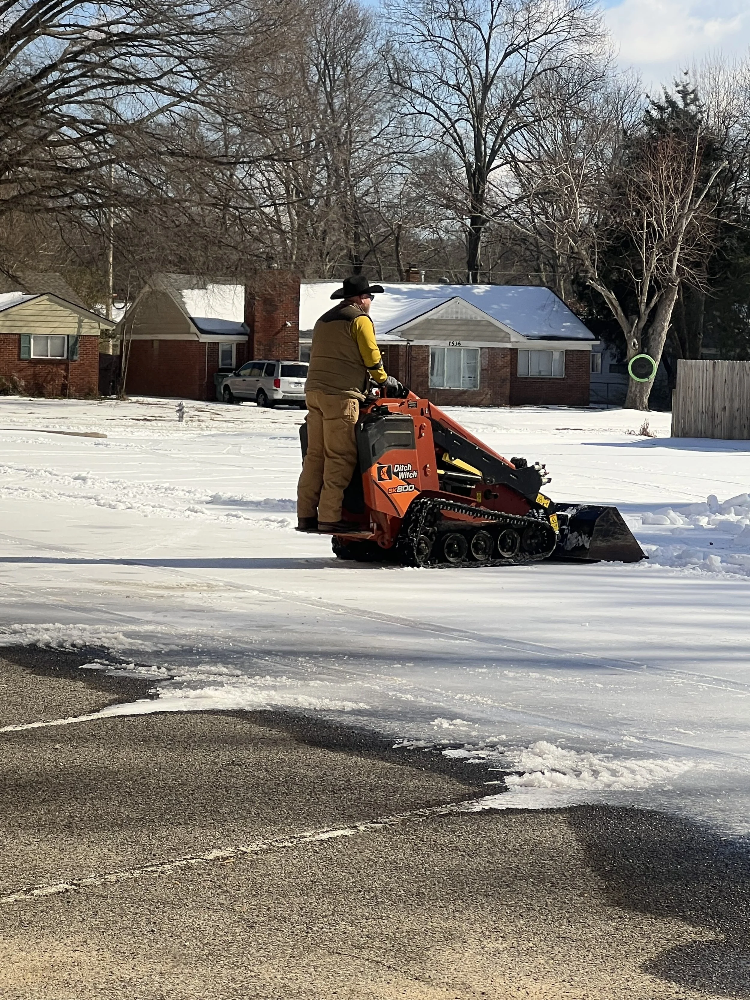 Clearing a church parking lot for service, Memphis, TN