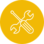 Icon of a wrench and screwdriver crossed over each other on a yellow circular background.