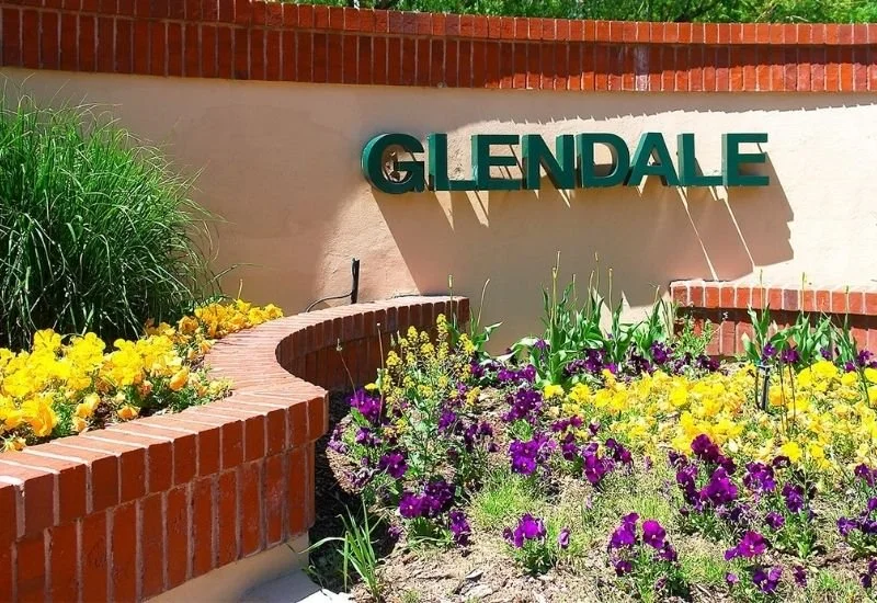 Glendale, Colorado sign surrounded by landscaped flower beds