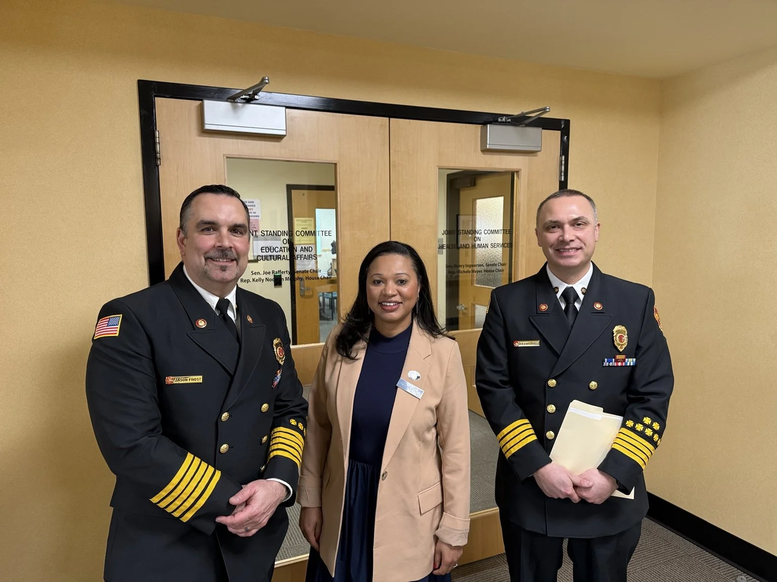 Rep. Flavia DeBrito with fire/EMS leaders at the Maine State House