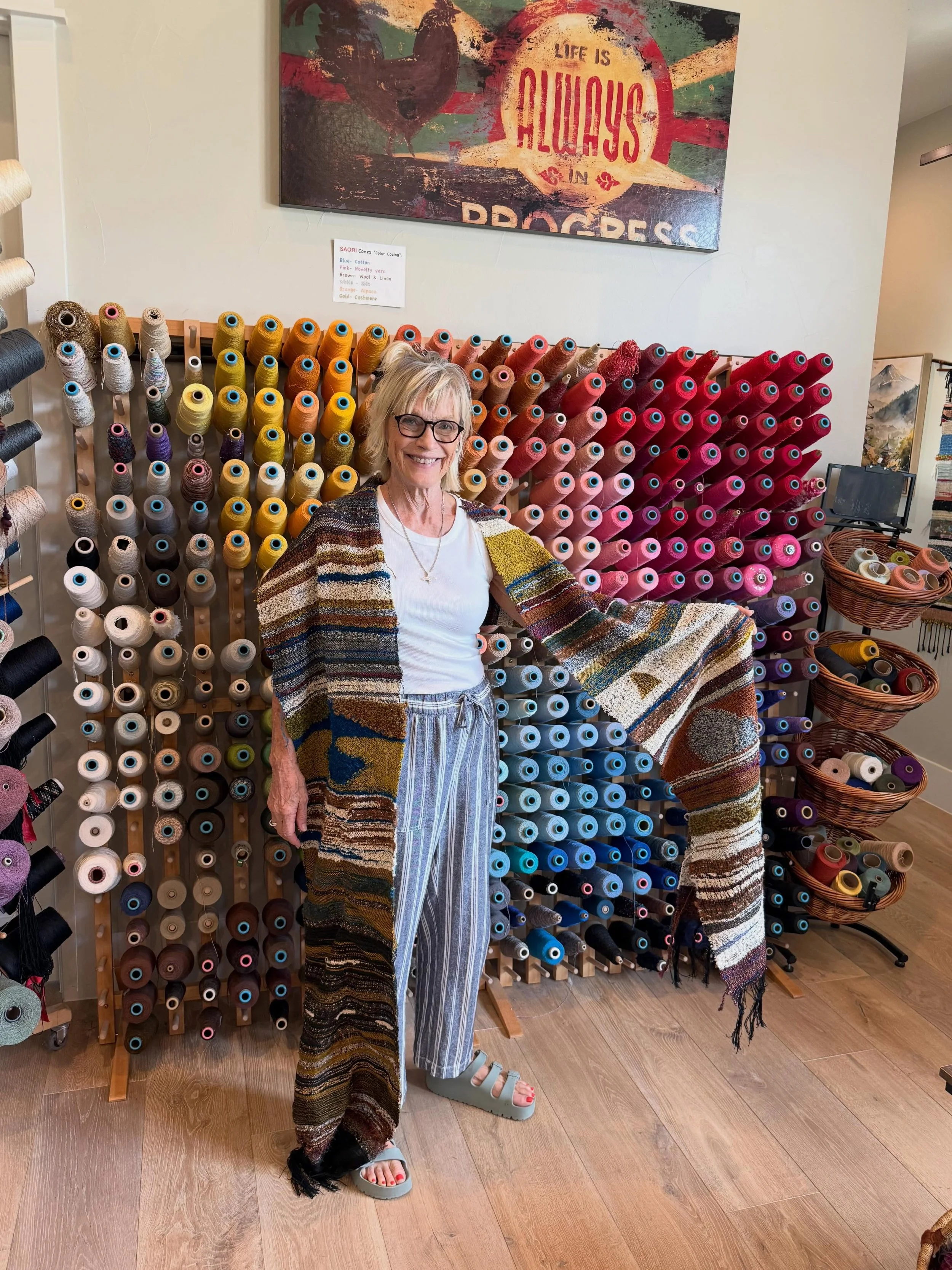 It&rsquo;s a WRAP!  Here are end-of-&lsquo;semester&rsquo; projects completed by some happy friends who are in our regular weaving groups.  Also included is first time SAORI weaver, Sunita showing her beautiful piece woven in a 4 hr. Workshop.
Taking