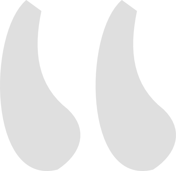 Close-up of stylized quotation marks in black and white.