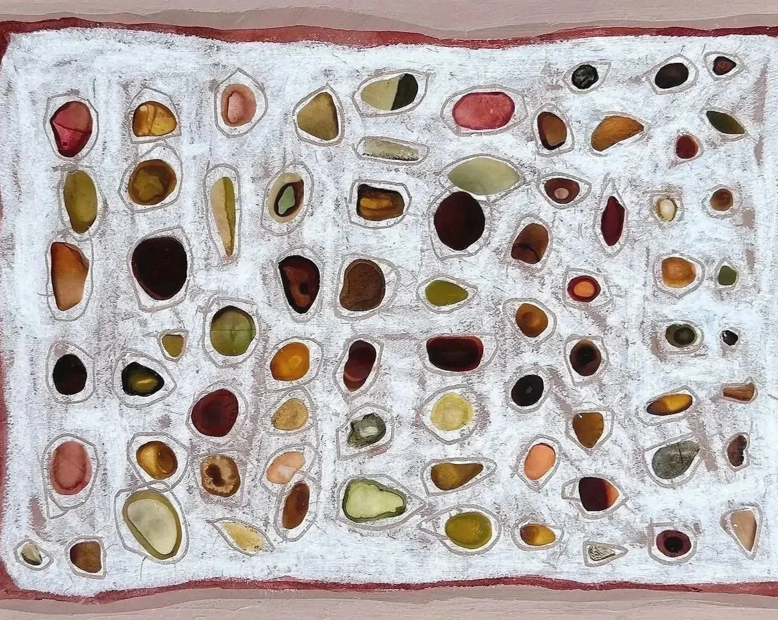 A colorful abstract painting with irregular oval shapes outlined in white, filled with various shades of red, yellow, green, brown, and black, on a textured white background bordered in red.