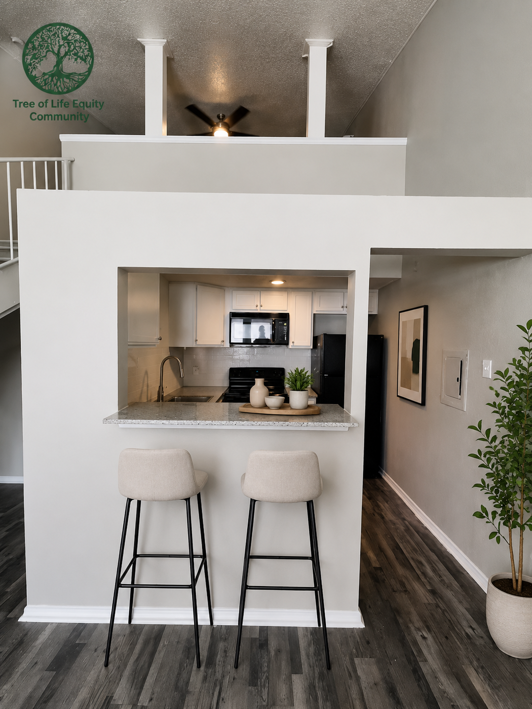 Modern open kitchen with a stylish breakfast bar, updated finishes, and a bright loft-style design.