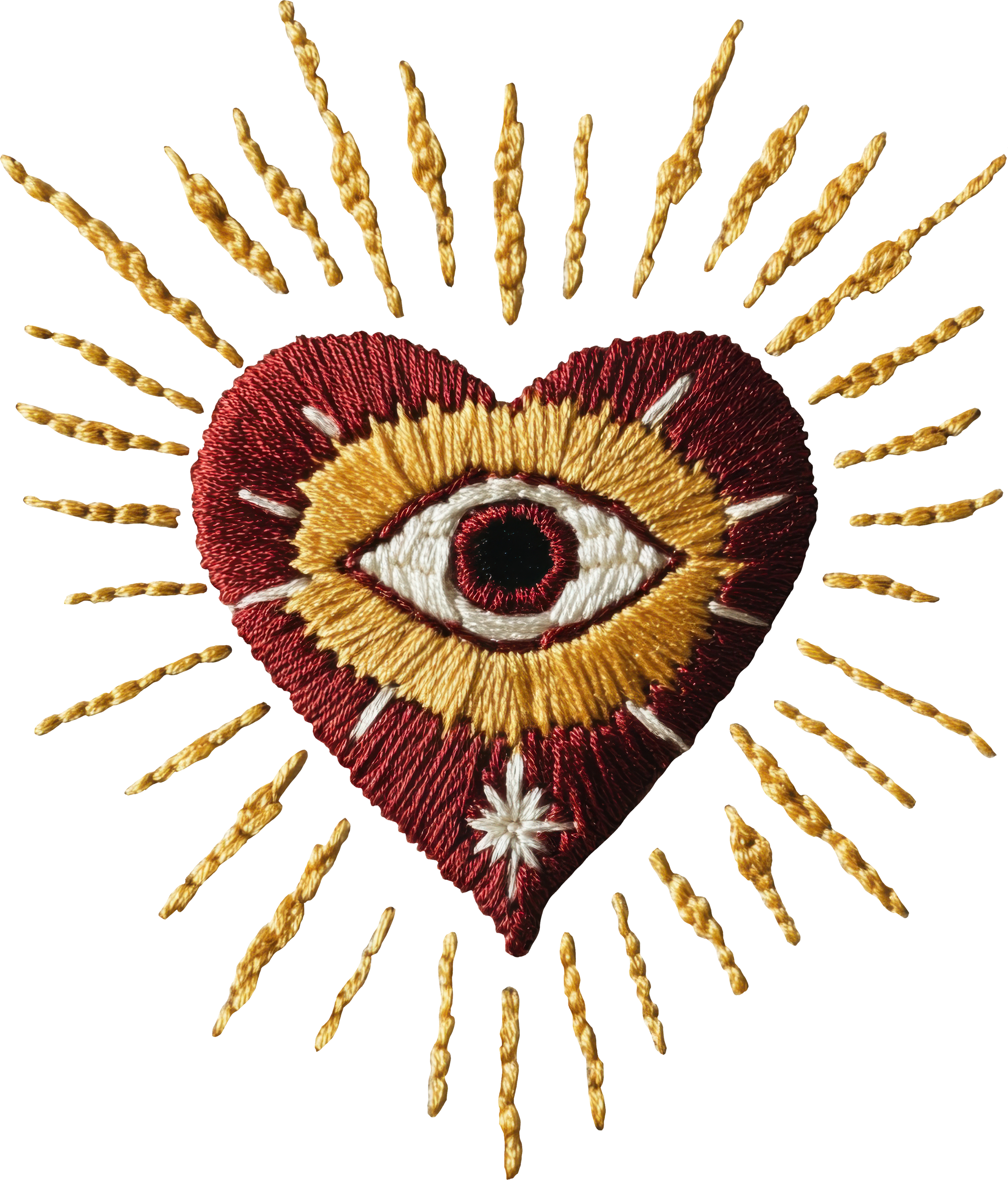 Embroidery of an eye on a fabric, surrounded by radiating gold thread lines, resembling a sunburst.