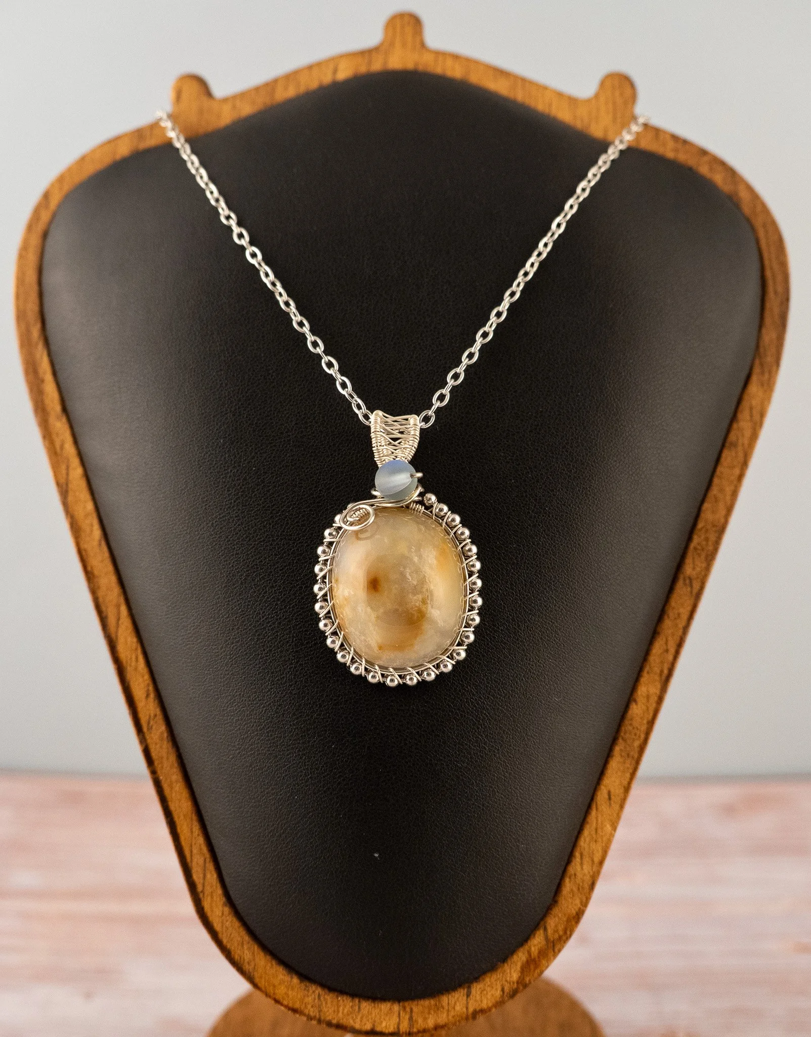 Grooved Polka Dot Agate Silver-Coated Copper Wire-Wrapped Pendant with Blue Accent Bead