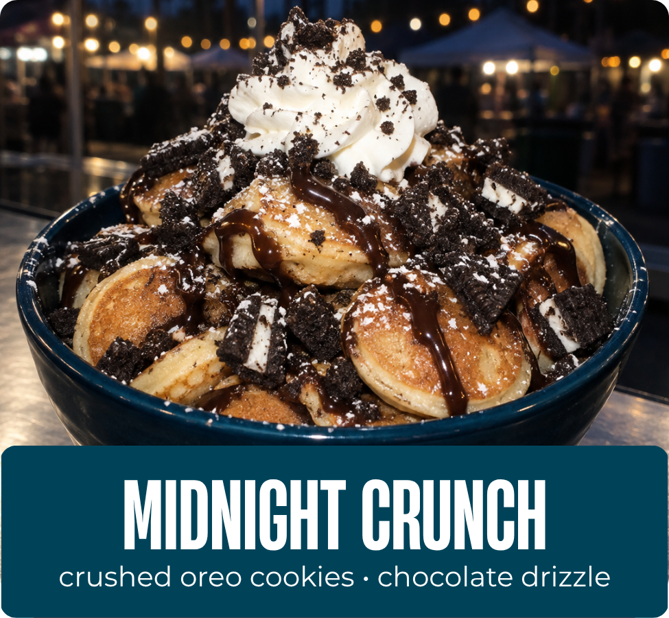Midnight Crunch mini pancakes with Oreo crumble, whipped cream, powdered sugar and chocolate drizzle.