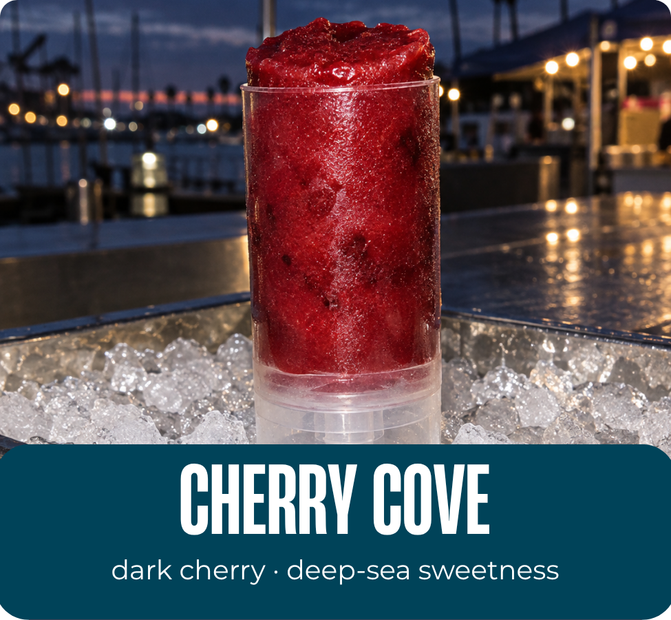 Cherry Cove dark cherry Tidesicle displayed over ice at sunset by the waterfront.