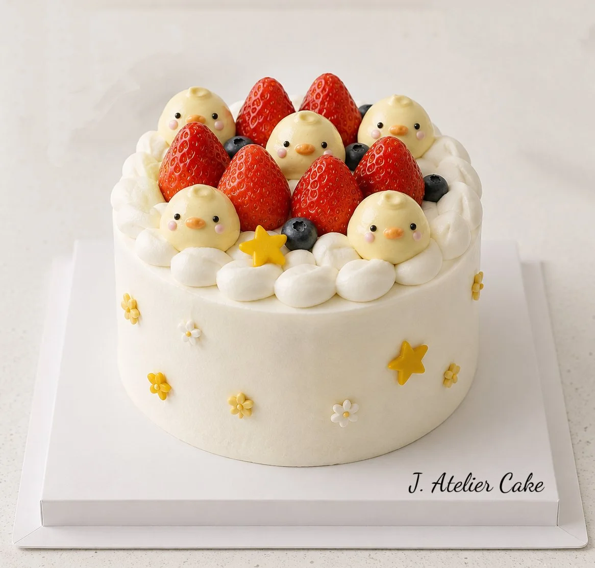 Korean-style buttercream themed cake with strawberries and cute character details by J. Atelier Cake in Lehi, Utah
