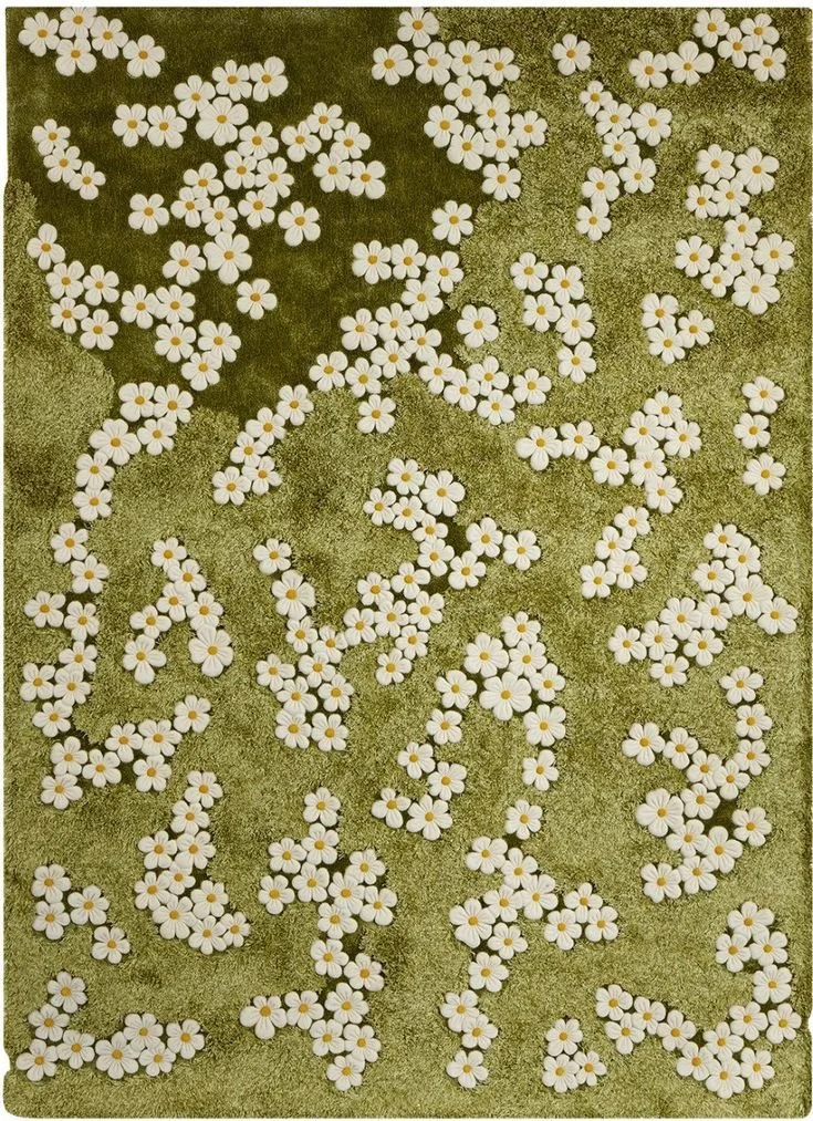 A green surface decorated with white daisies arranged to form cursive text.