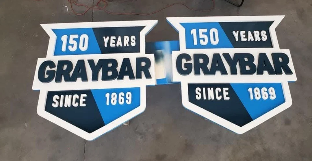 Two identical Graybar 3 Dimensional Fabricated Signage Created by Custom Graphics Georgia North Metro Atlanta Sign Installation and Service
