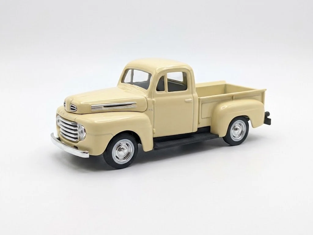 WHITE TRUCK FACING LEFT.jpg