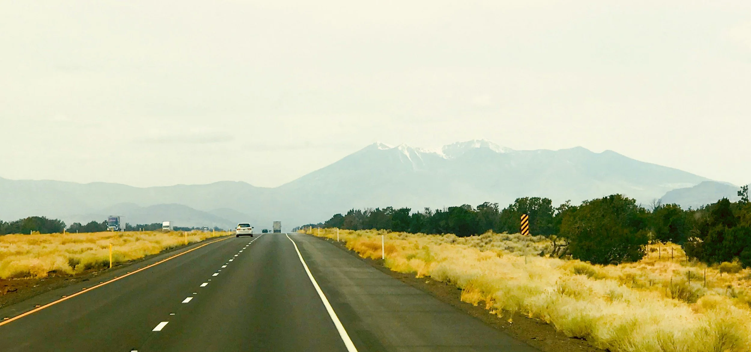 Snow capped Humphreys Peak view from Flagstaff Arizona road, Accelerated Resolution Therapy available to Flagstaff residents via telehealth
