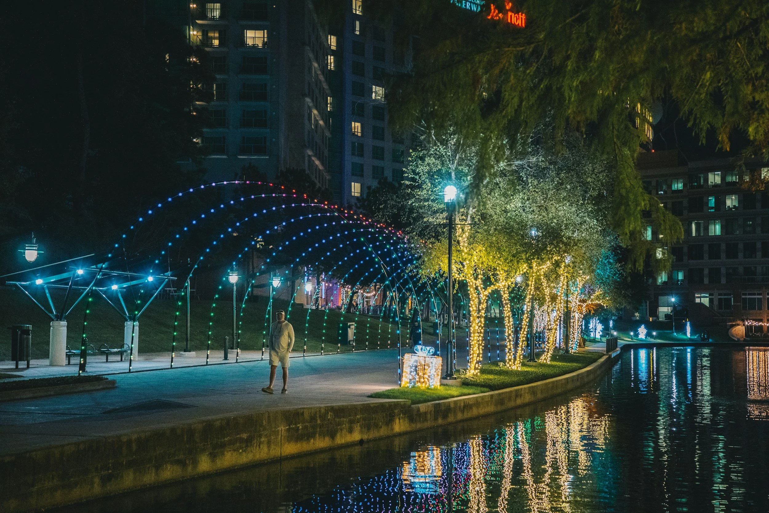 The Woodlands Waterway lit up at night in The Woodlands Texas, addiction therapy available to The Woodlands residents via telehealth