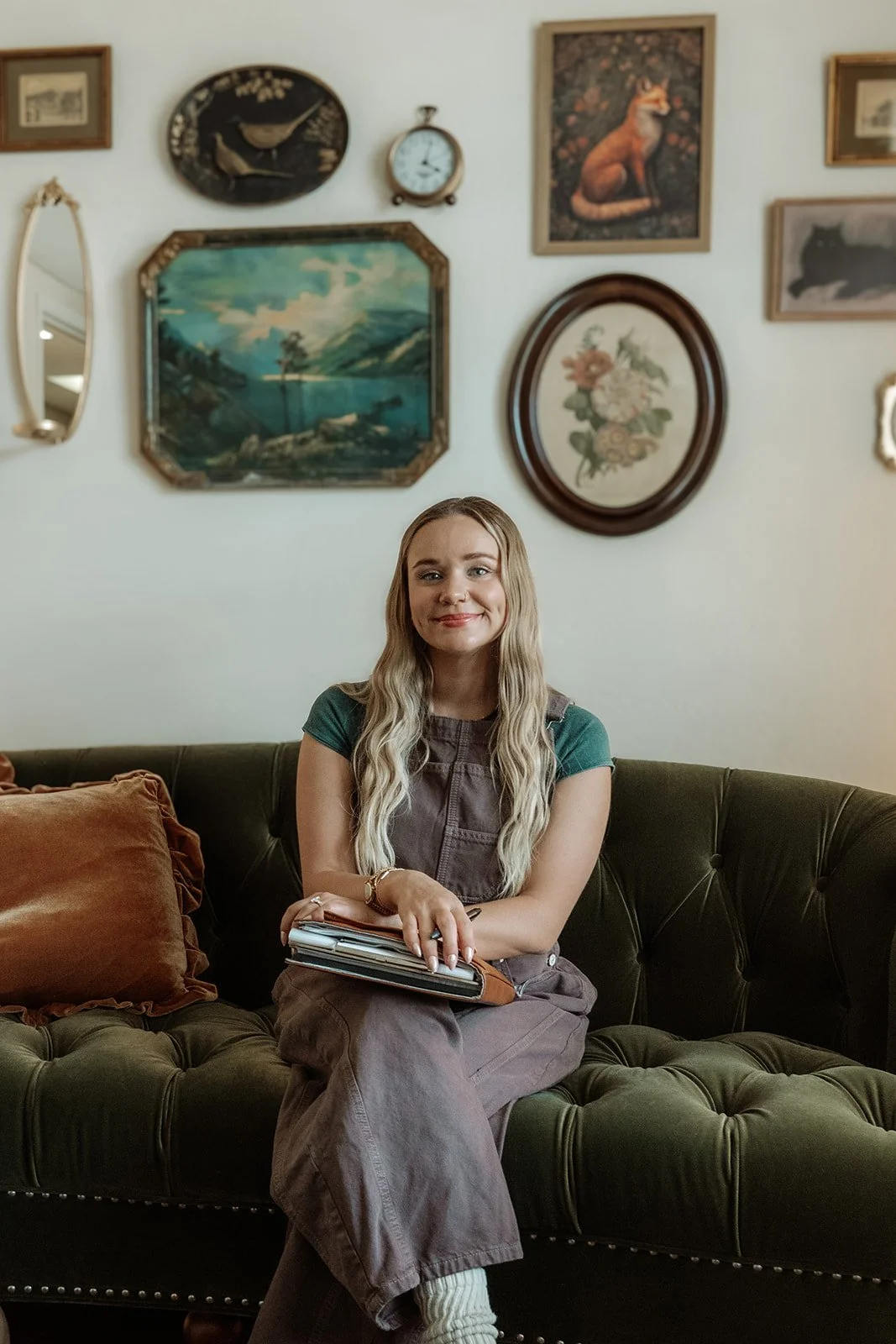 Loran Wallace anxiety therapist reviewing notes in therapy office Scottsdale Arizona, trauma-informed anxiety treatment