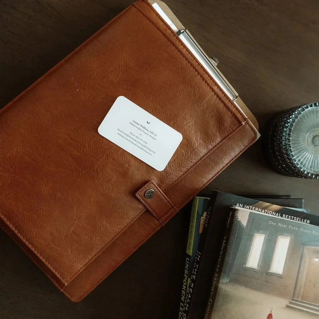 Therapy office details including binder and books, Post Induction Therapy practice Scottsdale Arizona 