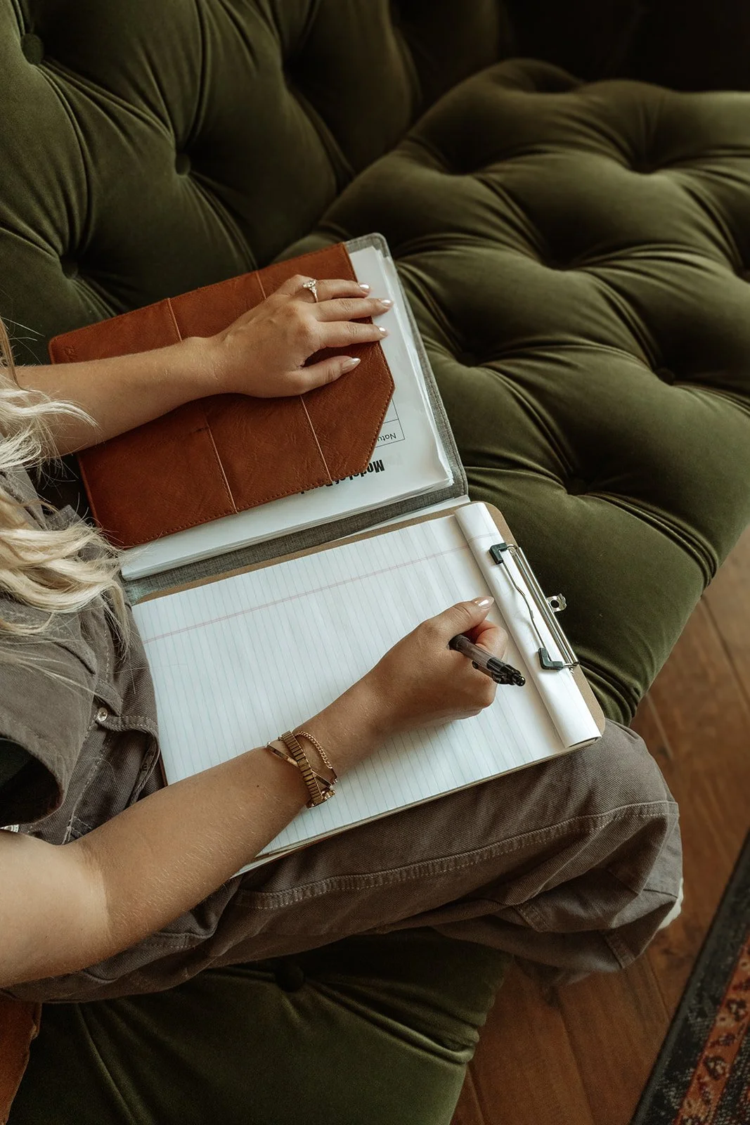 Therapist writing notes during Accelerated Resolution Therapy session, ART trauma therapy Scottsdale Arizona