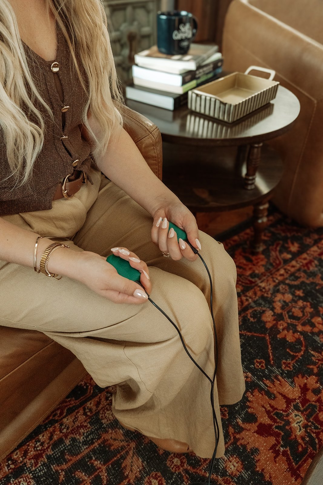 Therapist holding EMDR bilateral stimulation buzzers during session, EMDR therapy Scottsdale Arizona