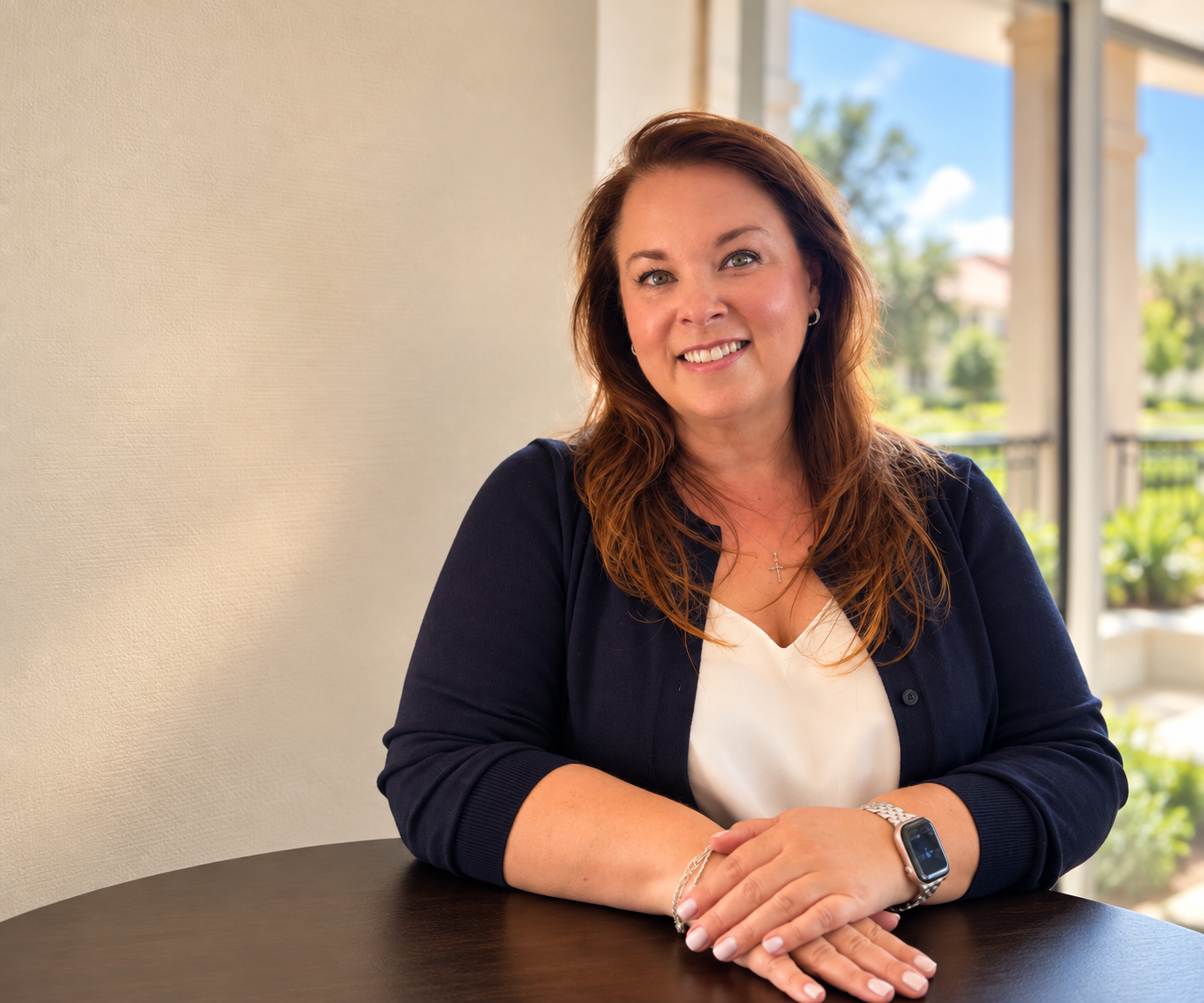 Trista Otto, founder of A Well-Poured Life, in a relaxed wine country setting.