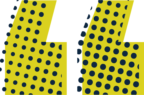 Close-up of yellow comic-style speech bubbles with black and blue dots.