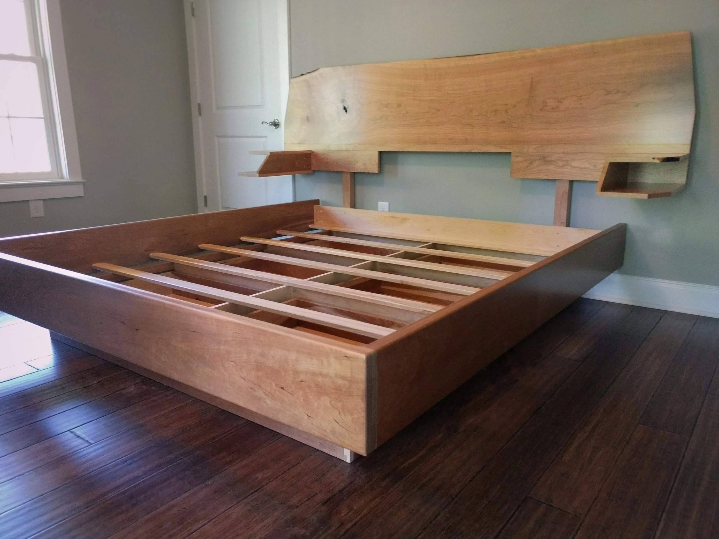 custom bed frame with headboard and shelves