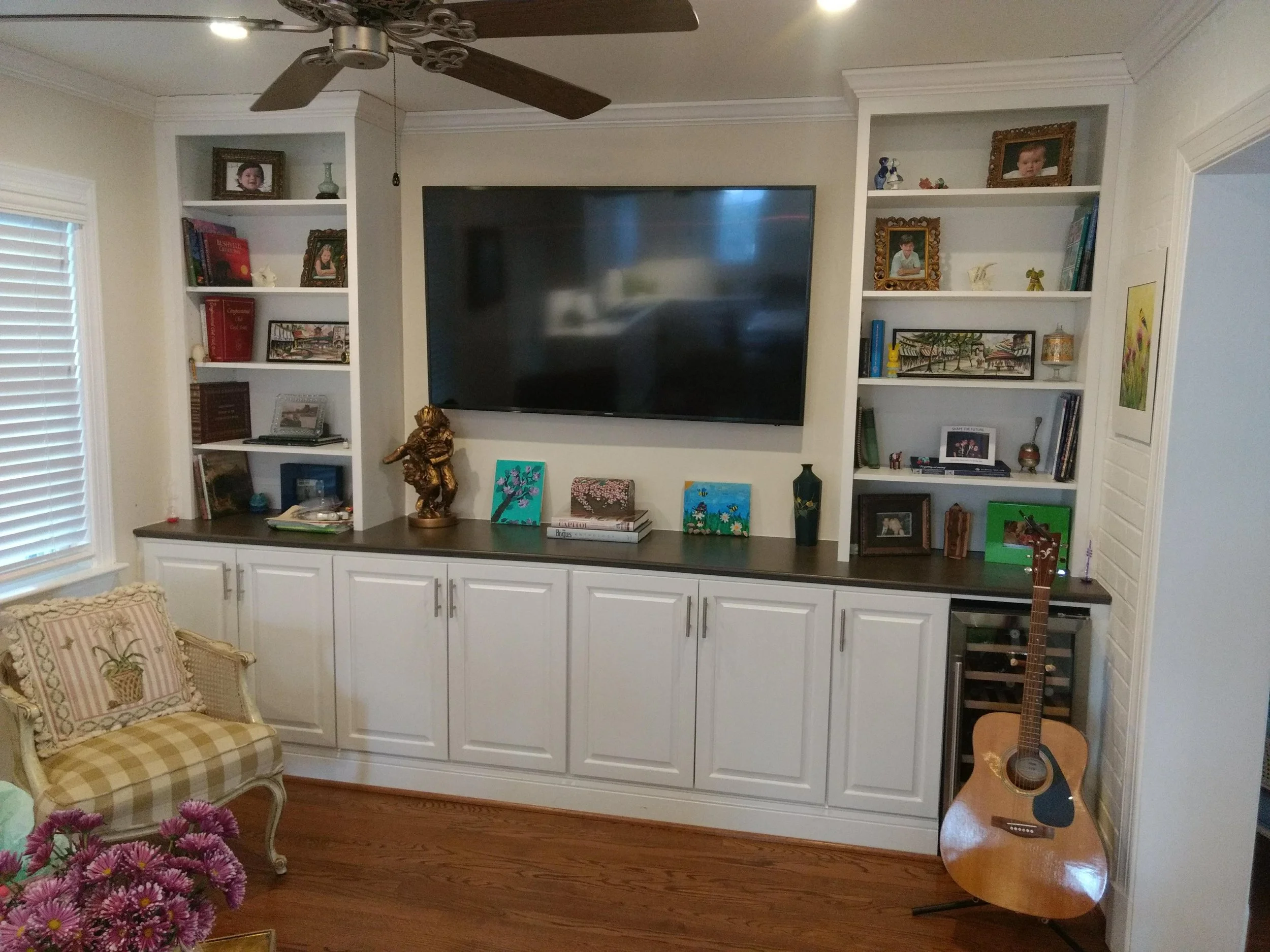 custom built-in entertainment unit with shelving and cabinets