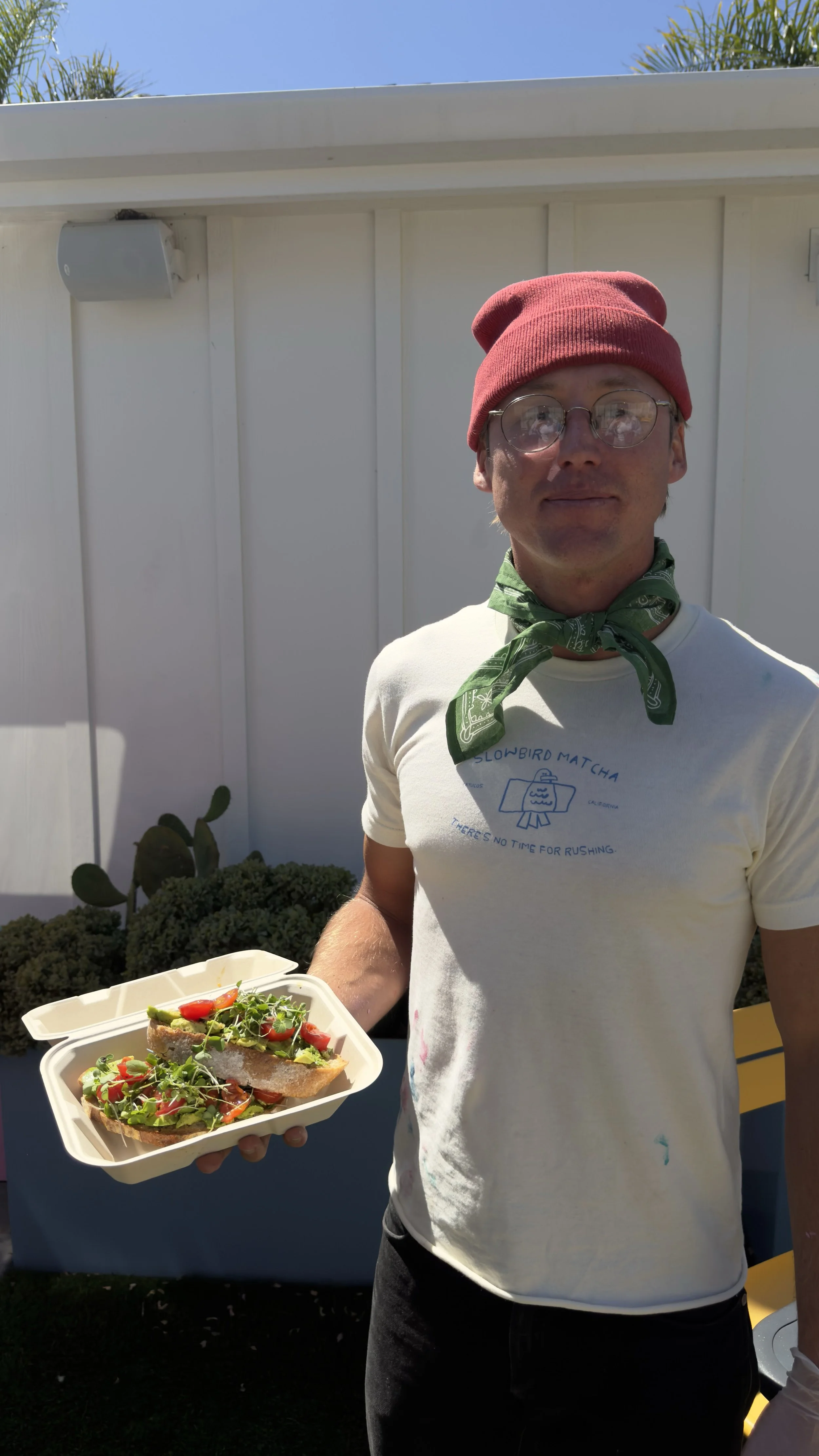 SLOWBIRD matcha, coffee, and toast owner kev serving all organic avocado toast