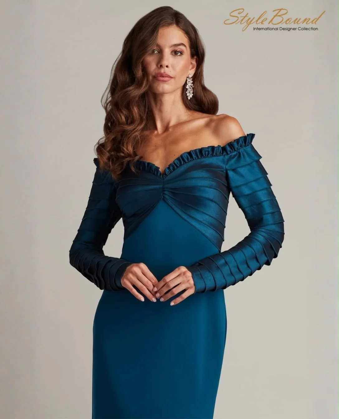 A dress in rich jewel tones designed to captivate. Featuring a gorgeous d&eacute;colletage and flattering silhouette.

#luxuryfashion#weddingguest# motherofthebride#designerwear#eventdressing 
For viewing and fitting call 072 528 4268